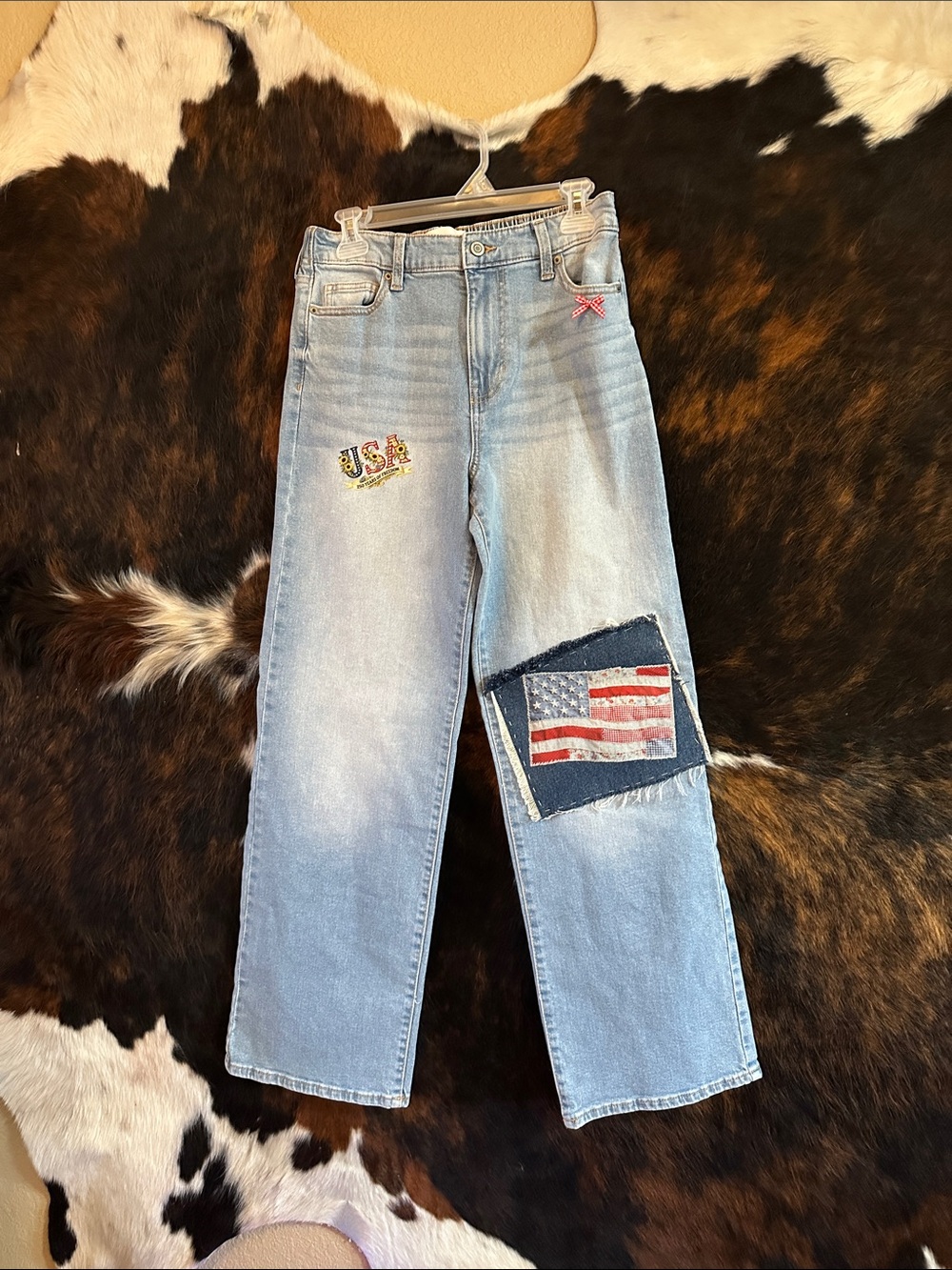 Light Wash Jeans with patriotic embellishments